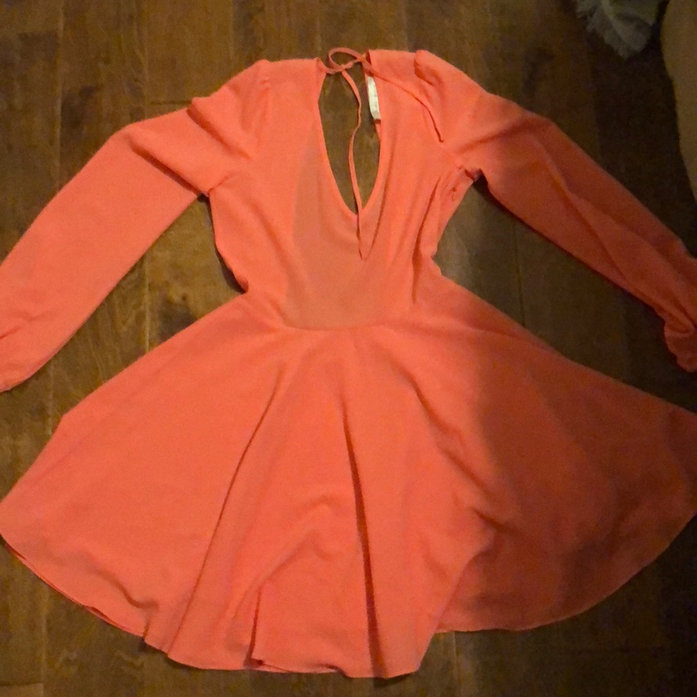 Pink long sleeve open back dress